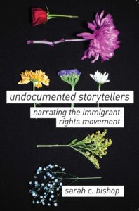 Cover of Sarah C. Bishop's Book. Black background with dried flowers and text that reads "undocumented storytellers. narrating the immigrant rights movement"