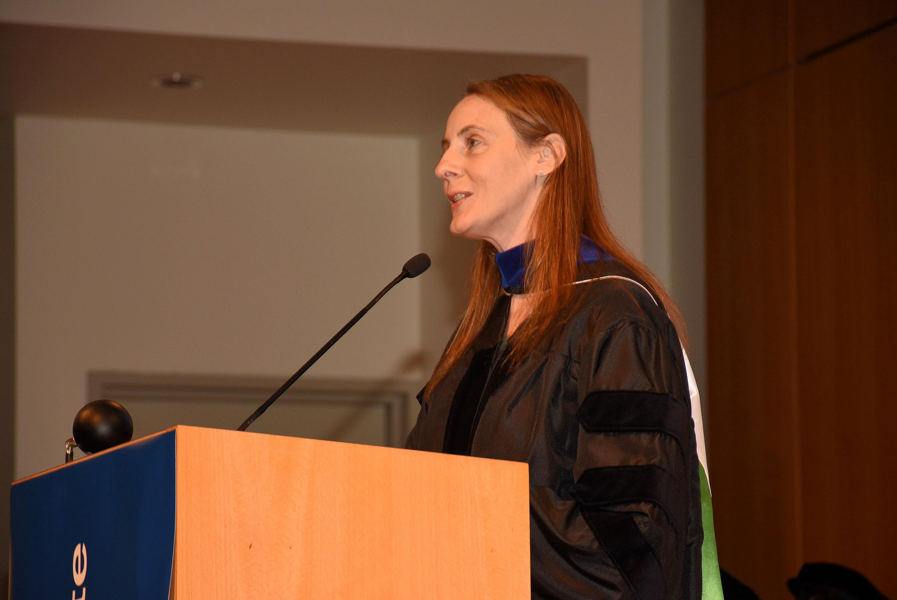 Photo of Tara Barca, the 2022 Commencement Faculty Speaker, giving her Commencement address