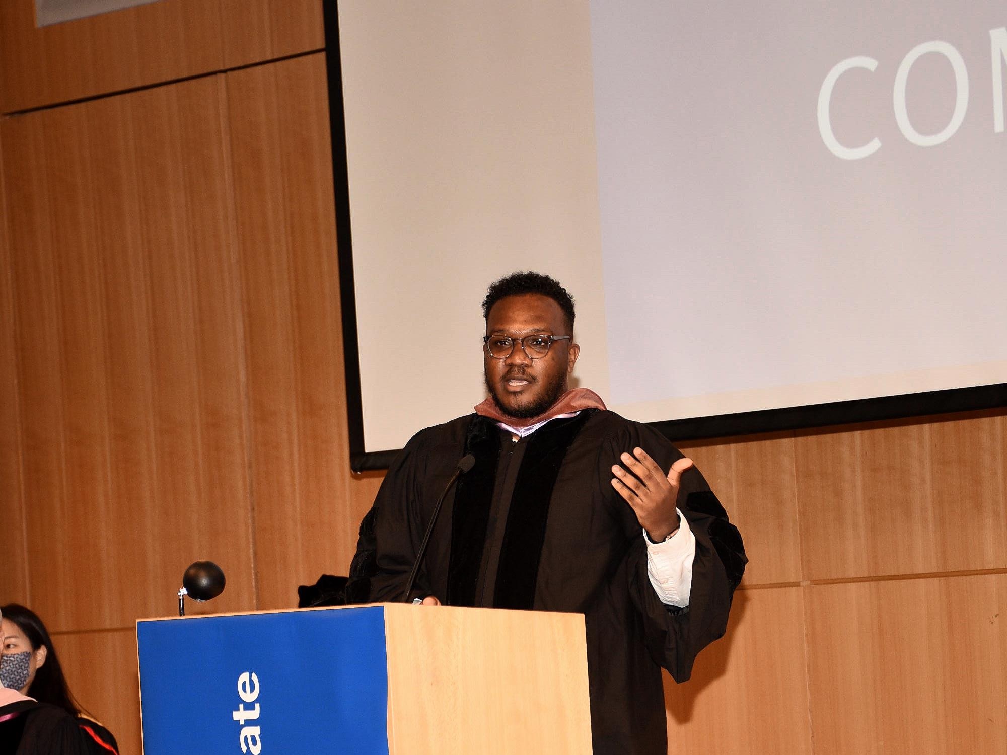 Photo of Khaair Morrison, 2022 Commencement guest speaker, giving his Commencement address