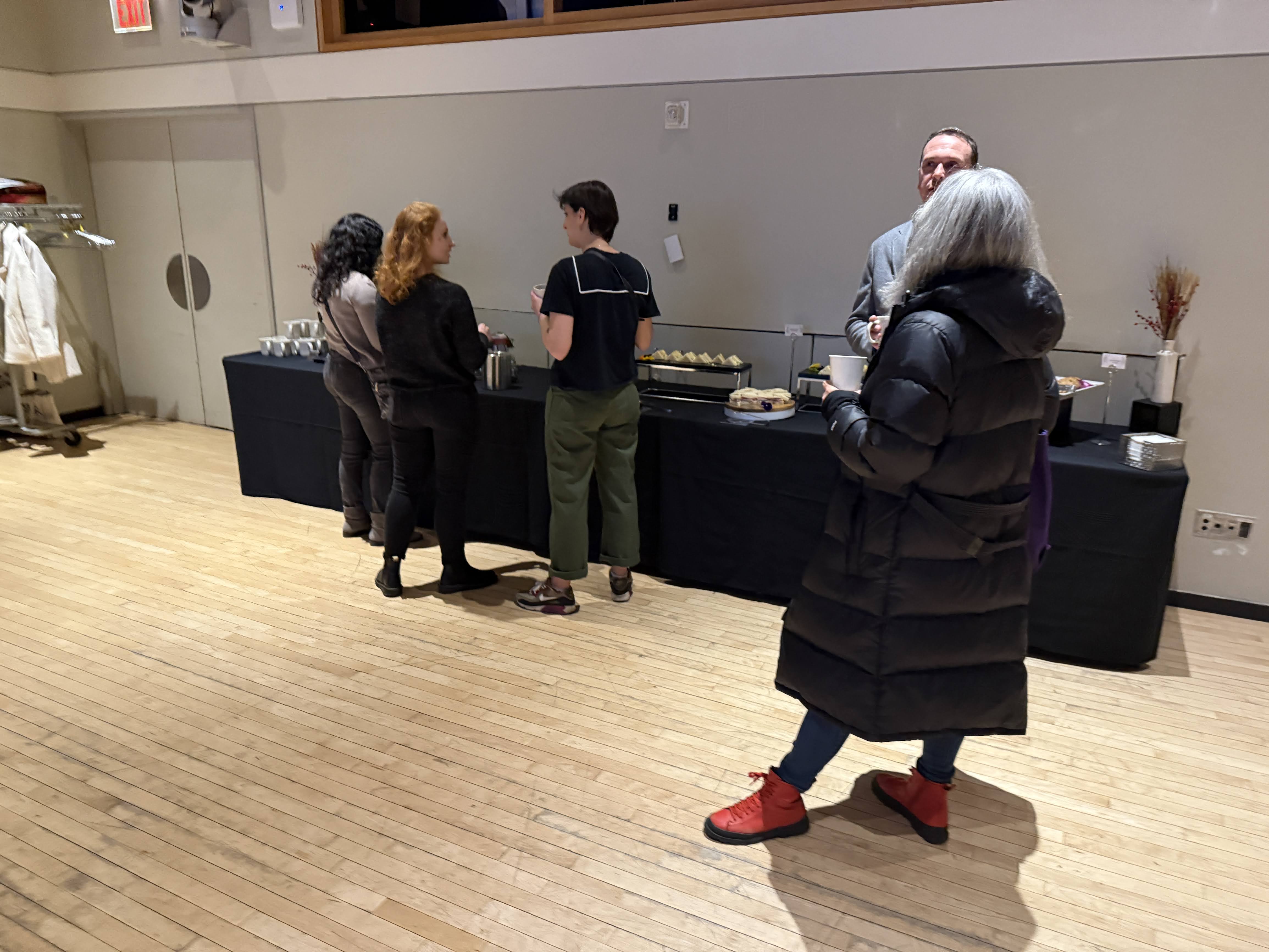 people standing around in a room