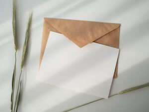 blank card over beige envelope